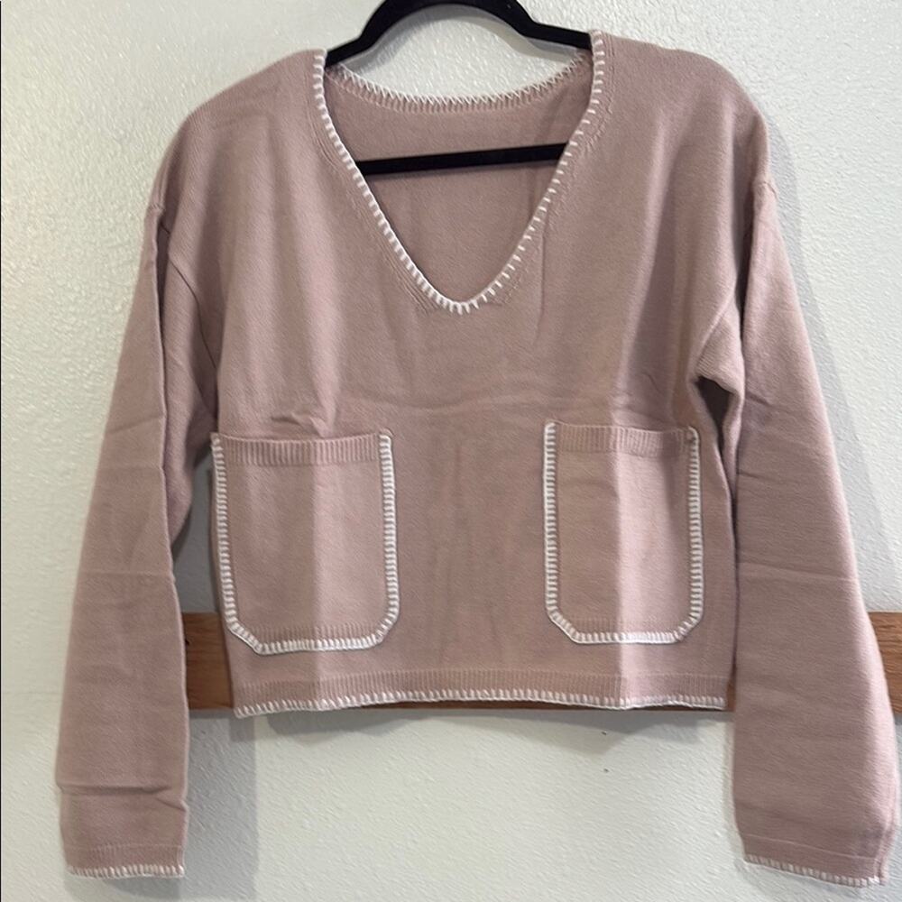 Women's V-Neck Sweater in Rose with decorative white stitching